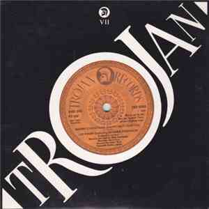 Lee Perry Featuring Sandra Robinson  / The Upsetters - Merry Christmas, Hap ...