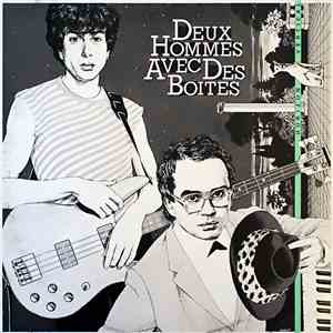 Deux Hommes Avec Des Boites - Horizon Vertical