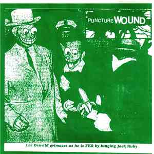 Puncture Wound - Lee Oswald Grimaces As He Is Fed By Lunging Jack Ruby